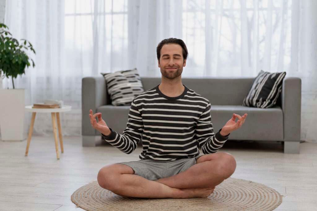 man doing yoga ; one of factor to get rid of butt acne